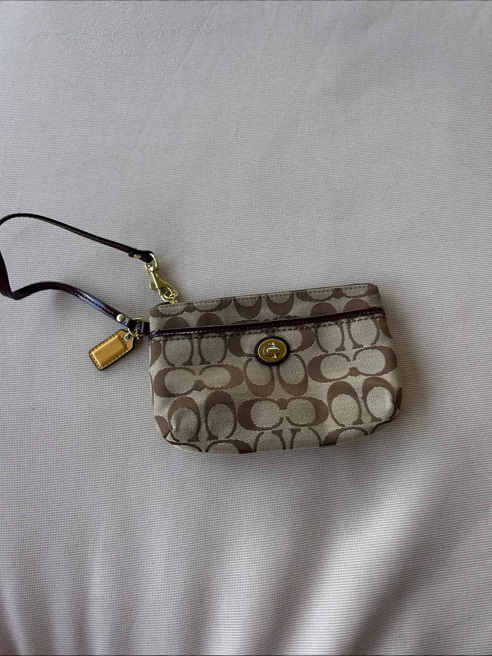 Coach Brown/Tan Signature Canvas Wristlet with Gold Hardware